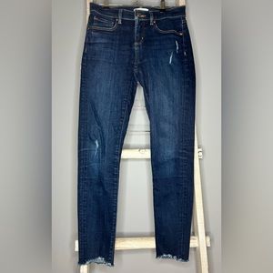Ann Taylor Loft Size 0 modern skinny Jeans distressed with raw hem.